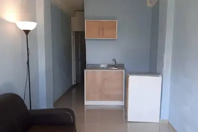 a kitchen with a sink and a counter top at Confortable apartaestudio en Santo Domingo Este in Santo Domingo