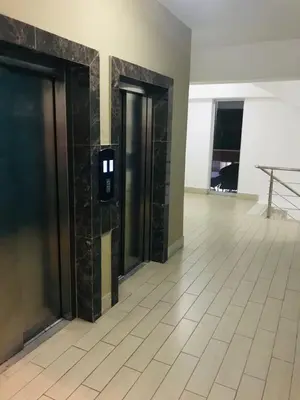 an empty room with two elevators in a building at Boca chica Apartment Near the bech in Boca Chica