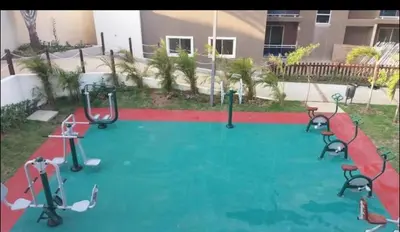 a playground in a building with a green and red at Residencial Mediterraneo in Santiago de los Caballeros
