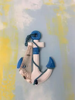 a wall decoration of a life preserver with a banana at Villa Ruben Juan Dolio in Juan Dolio
