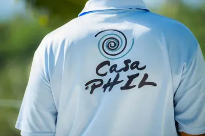 a back view of a white shirt with a caza phill at Casa Phil - Amazing Sea View Luxury Modern, Fully Staffed in Las Terrenas