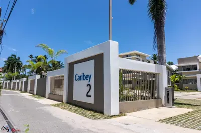 a fence with a sign that readsancy at Caribey2 APT 2A3 in Las Terrenas