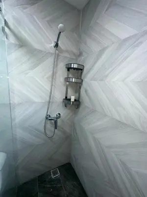 a shower in a bathroom with a white wall at Luxury 2 Bedroom Apartment, 1 Min Walk to Punta Popy Beach, Pool, AC, Fast WiFi, Las Terrenas in Las Terrenas