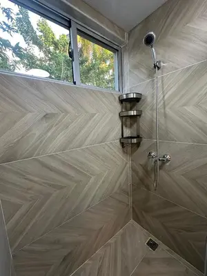 a shower with a blow dryer in a bathroom at Luxury 2 Bedroom Apartment, 1 Min Walk to Punta Popy Beach, Pool, AC, Fast WiFi, Las Terrenas in Las Terrenas
