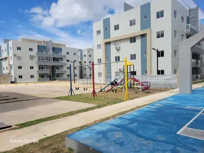 an empty playground in front of an apartment building at Solo para dos in La Romana
