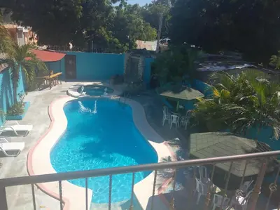 an overhead view of a swimming pool on a balcony at Casa Rural con Piscina in Azua de Compostela