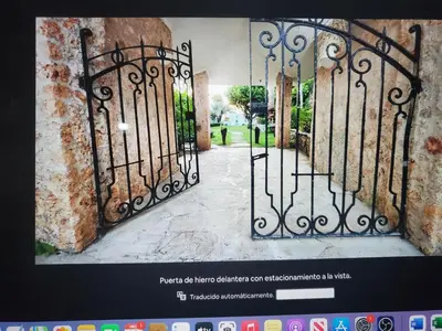 an image of an open gate of a house at Villa Los Corralillos in Cabrera