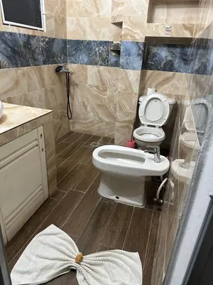 a small bathroom with a toilet and a sink at Casa Mariana in Las Terrenas