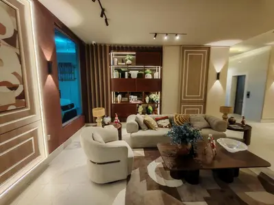 a living room with a couch and a table at Style and Confort Apart Villa Palmera in Santo Domingo