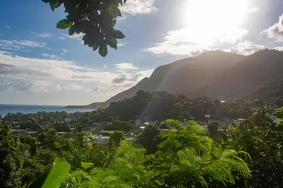a view of a valley with mountains and the ocean at Hotel-Restaurante Snack Cana in La Ciénaga