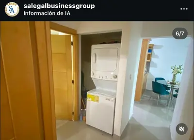 a kitchen with a white refrigerator in a room at S A Business RENTAL SALE in Juan López