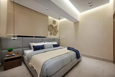 a bedroom with a king sized bed with blue accents at Lujoso Penthouse frente a la Playa de Boca Chica in Boca Chica