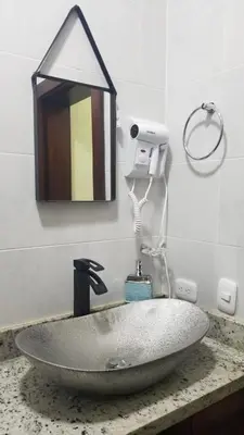 a sink in a bathroom with a mirror at My Deligth in San Felipe de Puerto Plata