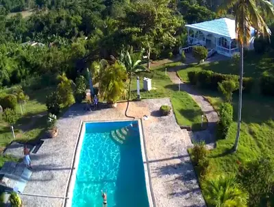 an aerial view of the house and the pool at Casa Blanca Samaná - Las Galeras in Las Galeras