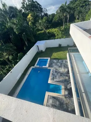 an aerial view of a swimming pool on a house at VillaGuerra-Piscina-Billar-BBQ-WiFi-Cozy-3Br-5Bds-7Pax in Guerra