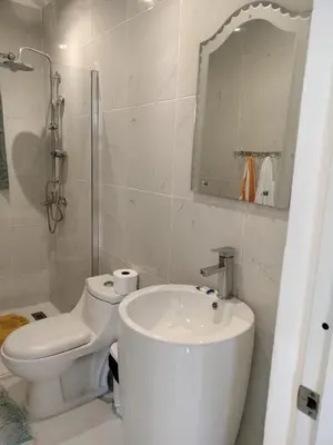 a bathroom with a sink and a toilet and a mirror at Vacacional las pascualas in Sánchez