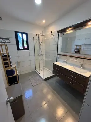 a large bathroom with two sinks and a shower at Villa Valentina Cabarete Procab in Cabarete