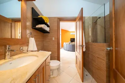 a bathroom with a sink and a toilet and a shower at Casa Linda Villa 918 - Sosua in Sosúa