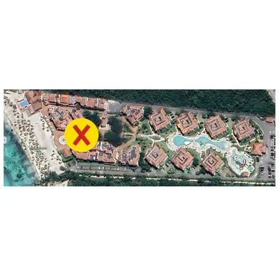 an aerial view of a resort with a x sign at 2BR 2BA Beachfront With View 62 in Bayahibe