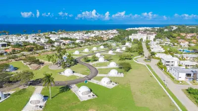 an aerial view of a park with white domes at Santa Fe Club in Sosúa