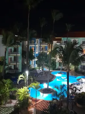 a view of the resort at night at Penthouse in El Cortecito in Punta Cana