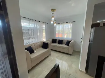 a living room with two couches and a couch at Villas Hillside apt 1 in Santa Bárbara de Samaná