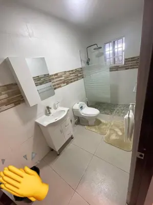 a bathroom with a sink and a toilet at Villas Hillside apt 2 in Santa Bárbara de Samaná
