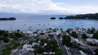 an aerial view of a town with boats in the water at Villas Hillside apt 2 in Santa Bárbara de Samaná