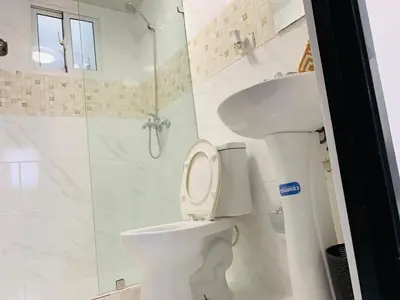 a bathroom with a toilet and a shower at Your Terrazas Del Este Getaway In La Romana in Cumayasa Kilómetros Diez