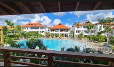 a view of the pool from the balcony of a resort at Residencial Paraiso in Bayahibe