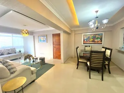 a living room with a couch and a table at Oasis Colonial in Santo Domingo