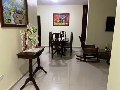 a dining room with a table and chairs at Casa de alquiler FIGARO in Villa Clara