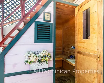 a sauna with a flower box in a cabin at Unusual Artist's Loft with jacuzzi and Roof Terrace in Sosúa