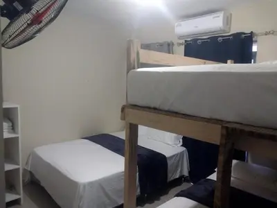 a room with two bunk beds in a room at Vista Montaña Jimenoa de la Rosa in Jarabacoa