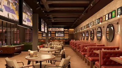 a restaurant with tables and chairs and a bar at Fiesta Americana Funeeq Punta Cana All Inclusive in Punta Cana
