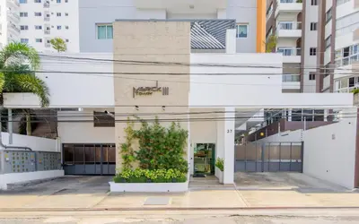 an external view of a building with a plant at Charming space in the city center in Santo Domingo