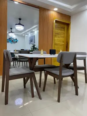 a dining room with a table and chairs at Modern, Unique And Stylish 1 Bedroom Apartment in San Pedro de Macorís