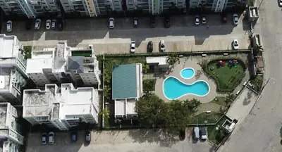 an overhead view of a large google logo in a yard at Chic Urban Retreat with Pool, Gym, & Free Parking in Santiago de los Caballeros