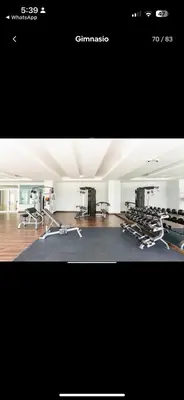 a picture of a gym with treadmills at Acogedor Apartamento con Vista al mar in Juan Dolio