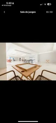 a picture of a table and chairs in a room at Acogedor Apartamento con Vista al mar in Juan Dolio
