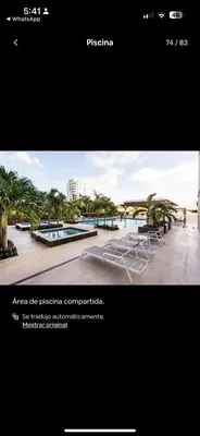 a screenshot of a website with a picture of a pool at Acogedor Apartamento con Vista al mar in Juan Dolio