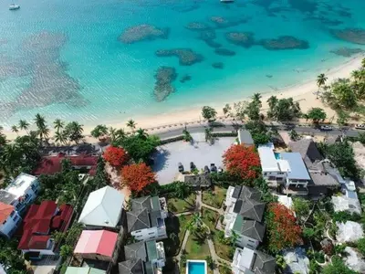an aerial view of a beach and the ocean at Gorgeous apartment steps to Playa Punta Popy in Las Terrenas