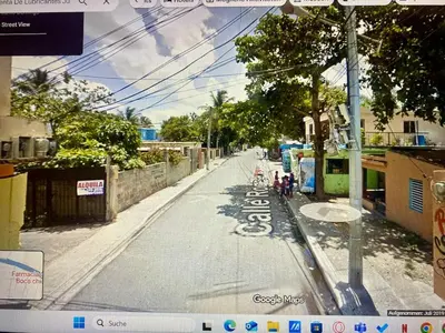 a view of a street with a bike lane at Residencial A&H in Boca Chica