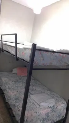 a couple of bunk beds in a room at Villa Tulum in San Cristóbal