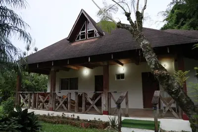 a house with a gambrel roof at Villa Claudia Constanza in Arroyo Frío
