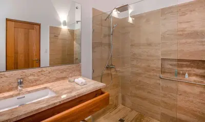 a bathroom with a sink and a shower at Viva V Samana by Wyndham, A Trademark Adults All Inclusive in Las Terrenas