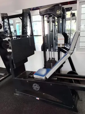 a gym machine with a treadmill in a gym at Apartment in Harmony I in Santiago de los Caballeros
