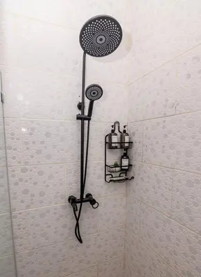 a shower with a shower head in a bathroom at Beautiful ocean and mountain view villa in Gaspar Hernández