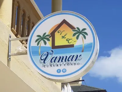 a sign for a vaminarhury cottages at Vamar Apartamentos in San Felipe de Puerto Plata