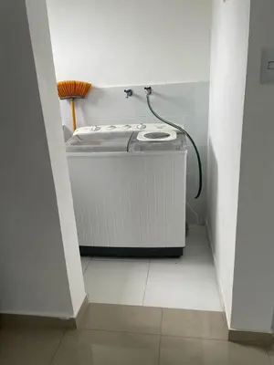 a bath tub in a corner of a room at Apartamento acogedor a 5 minutos de la playa in San Felipe de Puerto Plata